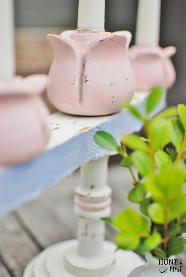 Make an ordinary thrift store candlestick into an original by not just painting it, but adding fabric for a fun, unexpected touch! www.hutnandhost.net