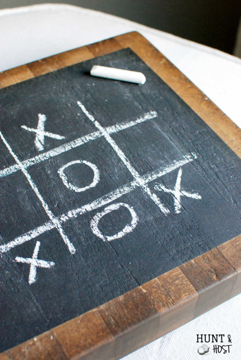 This thrifted old butcher block gets a chalkboard makeover to display a fun game of tic tac toe for the family! www.huntandhost.net