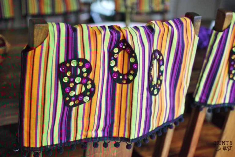 Halloween hits the dining room with these Halloween chair covers.