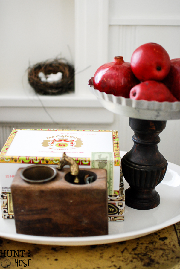 Never underestimate the dollar store. DIY milk glass tutorial to make a fabulous budget friendly centerpiece.