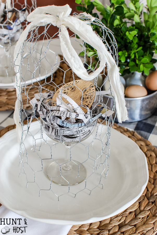 Easy spring decorating ideas from a DIY chicken wire cloche tutorial to newspaper nests. All you need for the most beautiful spring tablescape.