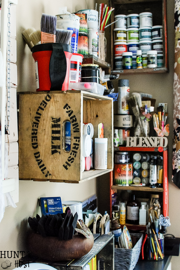 New crates get an old makeover with stain and stencils. Great for extra storage and organizing see an easy tip on how to hang crates without damaging them while still having them sturdy and straight.