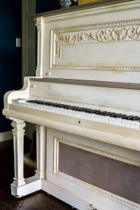 Painted Piano: This 100 year old piano gets a makeover with a two color scheme, a fresh piano painting idea with a color and product source guide.