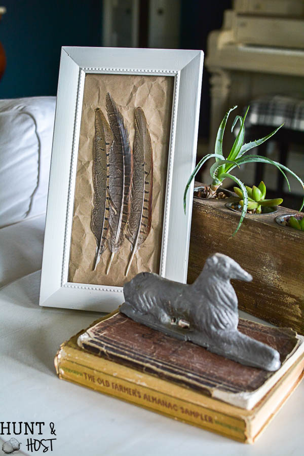 A great gift for guys this DIY small peasant art is easy and inexpensive to make from Pheasant feathers!