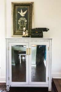 I can't believe this old entertainment center was on the curb. Now it is a fabulous antiqued mirror French chest.