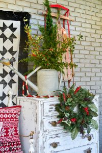 Christmas wreath ideas for your front porch. Get in the Christmas spirit with this fun porch tour full of Christmas decorating ideas!