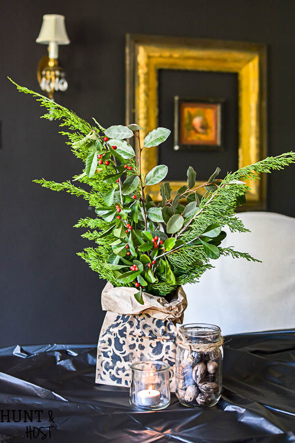This easy holiday centerpiece idea is perfect for a last minute table or a large banquet setting. Easy and inexpensive paper bag