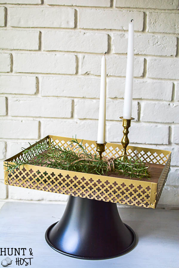 Upcycled DIY tray with tin trim and an upcycled speaker base.