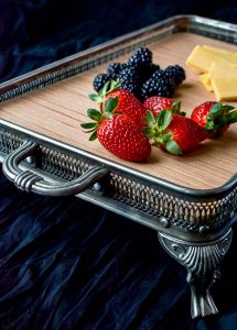 I found these old casserole servers missing their dish at a garage sale. They were so easy to turn into beautiful trays that could be used to organized kitchen counters, a cute nightstand tray, coffee table tray, fruit and cheese tray or serving platter. The possibilities are endless with this easy DIY silver tray makeover!
