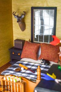 How precious is this rustic boys bedroom? These dollhouse bedroom ideas are perfect for the outdoor loving little boy, deer mount and all!