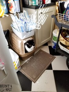 Turn your empty kitty litter jugs into cute storage buckets. Upcycling empty containers for inexpensive DIY organizing is quick and easy!