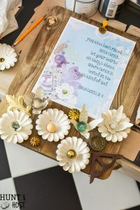 Cute DIY ideas to upcycle old wood cutting boards into decor. This one uses old wedding candelabras for home decor!