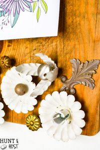 Cute DIY ideas to upcycle old wood cutting boards into decor. This one uses old wedding candelabras for home decor!