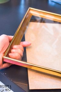 See how to change the color of a gold picture frame and update your old picture frame with a fresh new look. This sweet typography bicycle art is perfect for spring and great inspirational wall art!