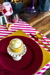 Create a table setting inspired by The Greatest Showman! Perfect for a glam circus theme dinner or just for a cute Greatest Showman tablescape to entertain the family. Anne's pink hair and the smell of peanuts round out this glitzy gold and fuchsia party scene.