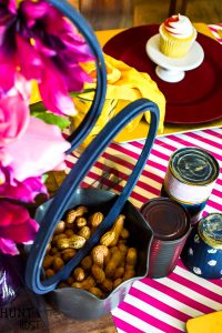 Create a table setting inspired by The Greatest Showman! Perfect for a glam circus theme dinner or just for a cute Greatest Showman tablescape to entertain the family. Anne's pink hair and the smell of peanuts round out this glitzy gold and fuchsia party scene.