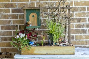 Take your fairy garden vertical with this natural fairy garden setting, complete with an actual fairy garden and swimming hole. This fun summer project to do with the kids will get your creativity going and green thumb working. Make a mini fairy garden for your house or porch with these precious fairy supplies and easy miniature ideas!