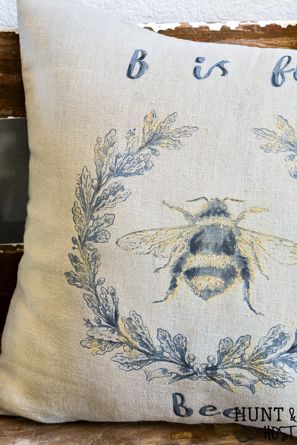 This stunning DIY Bee pillow is perfect for a teacher gift or your classic decorative pillow stash. Quick and easy to make with stencils from a Maker's Studio Chalk Art collection. Complete with a list of the products you need to make your own DIY bee pillow cover!