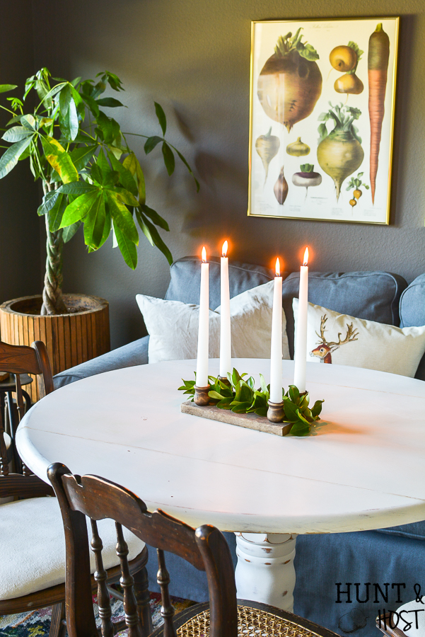 This DIY aged barn wood decor idea is so simple. Make a dual use tray out of DIY barn wood for a festive candle riser or gorgeous rustic centerpiece. #barnwood #barnwooddecor #barnwoodproject #candleriser #centerpieceidea