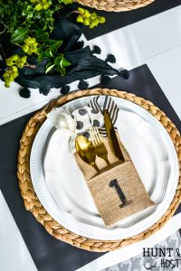 Your source for burlap utensil holders and an easy DIY tutorial to decorate these burlap utensil ouches for an everyday table setting or holiday tablescape. #tablescape #utensilorganizing #holidaytable #everydaydining #burlapdecor #silverwareholder #ribboncraft