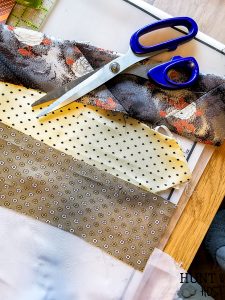 How to make old neckties into precious jewelry. This no sew necktie craft will recycle those out of style thrift store neckties into a cute tassel necklace on a serious budget. #diyjewelry #upcycleidea #vintagestyle #necktieaccessory #fashiononabudget