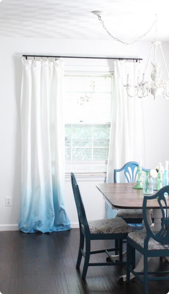 Unexpected DIY curtain ideas for your home,. Theses easy curtain ideas will have you treating your window in no time. A variety of textures, colors and styles wait in this DIY window curtain collection. #windowcovering #DIYcurtain #drapes #dropclothcurtaintutorial #prettywindow