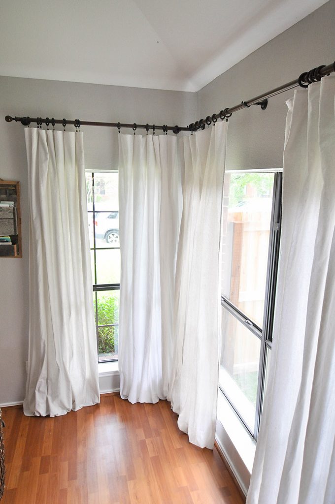 Unexpected DIY curtain ideas for your home,. Theses easy curtain ideas will have you treating your window in no time. A variety of textures, colors and styles wait in this DIY window curtain collection. #windowcovering #DIYcurtain #drapes #dropclothcurtaintutorial #prettywindow