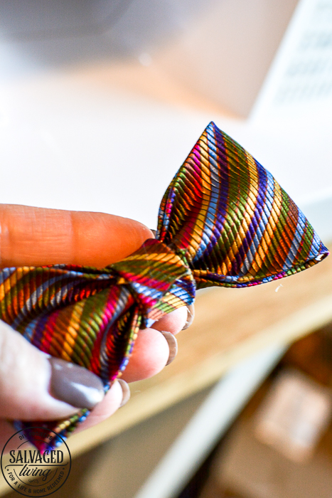 This dog bow tie DIY tutorial is special because we use vintage neckties for pet bow ties! Add some vintage style to your pooch's wardrobe with this easy bowtie tutorial! #dapperdog #dogbowtie #catbowtie #animalclothes #petaccessories #dogcollardiy #diypetaccessory #necktieproject #scrapfabricproject #vintagenecktieidea