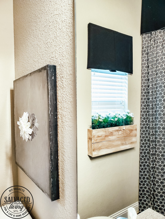 Steal some cozy black and white bathroom ideas to decorate you bathroom into a haven! The floor to ceiling shower curtain treatment and indoor window flower box are fabulous! #blackandwhitedecor #blackandwhitebathroom #teenbathroom #cozybathroomidea #showercurtainideas #DIYwindowbox #indoorwindowbox #tweengirldecorating