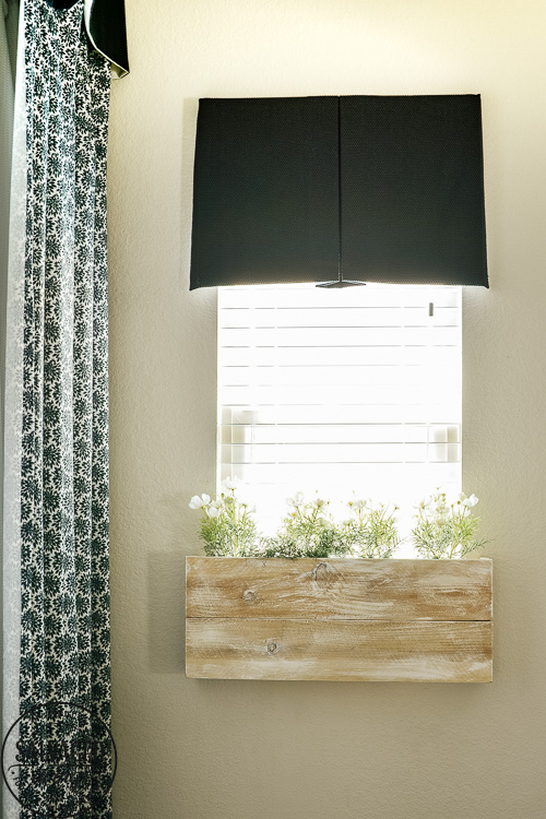 Steal some cozy black and white bathroom ideas to decorate you bathroom into a haven! The floor to ceiling shower curtain treatment and indoor window flower box are fabulous! #blackandwhitedecor #blackandwhitebathroom #teenbathroom #cozybathroomidea #showercurtainideas #DIYwindowbox #indoorwindowbox #tweengirldecorating