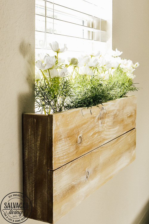 Steal some cozy black and white bathroom ideas to decorate you bathroom into a haven! The floor to ceiling shower curtain treatment and indoor window flower box are fabulous! #blackandwhitedecor #blackandwhitebathroom #teenbathroom #cozybathroomidea #showercurtainideas #DIYwindowbox #indoorwindowbox #tweengirldecorating