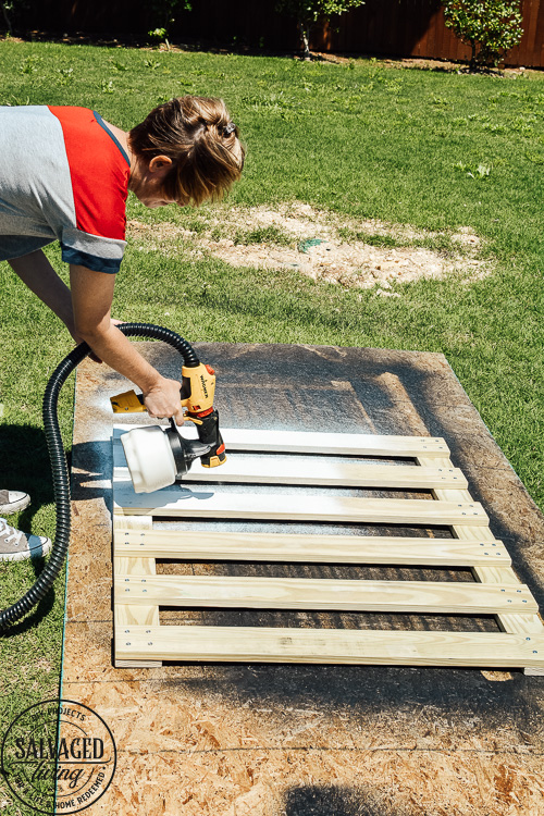 How to build a stylish stairway gate to keep pets or kids out! This easy DIY gate tutorial will look great and blend with your traditional decor. We keep our dog off the carpet with this pet gate. #petgate #stairgate #childproof #DIYpet #cleancarpet #doggate #petgatediy #petgateforstairs