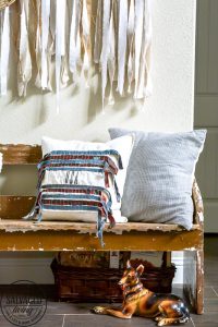 This decorative DIY patriotic pillow cover is perfect for your summer decor, plus it's perfect for a quick seasonal pillow change on a budget. #easyDIYpillows #decorativepillows #fourthofjulypillow #4thofjulydecorations #scrapfabricproject #patrioticdecor