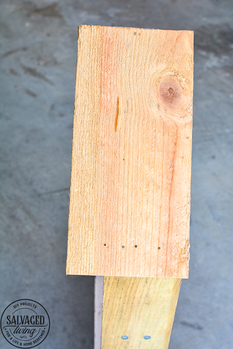 How to build a DIY bug house from scrap wood, perfect for a summer project with kids. Invite good bugs into your garden with this bug hotel, you will soon find solitary bees and insects taking up residence in your yard. #bughouse #savethebees #goodbugs #scrapwood #buildlikeagirl #gardenart #gardenproject #naturalgardencare