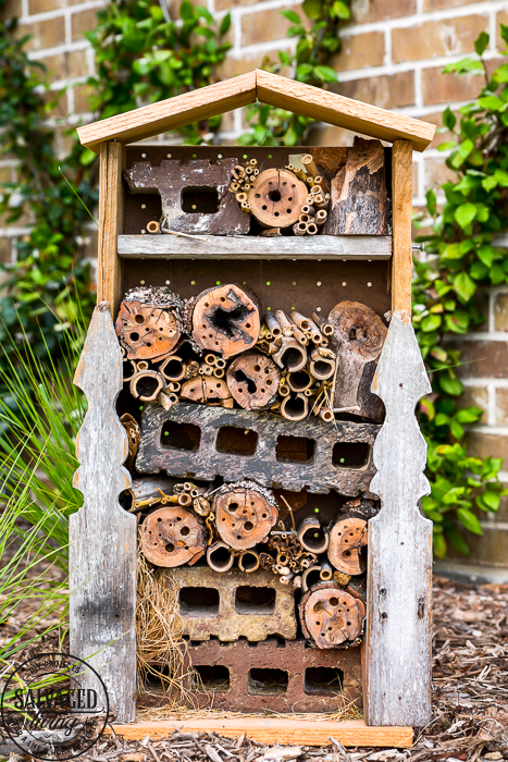 How to build a DIY bug house from scrap wood, perfect for a summer project with kids. Invite good bugs into your garden with this bug hotel, you will soon find solitary bees and insects taking up residence in your yard. #bughouse #savethebees #goodbugs #scrapwood #buildlikeagirl #gardenart #gardenproject #naturalgardencare