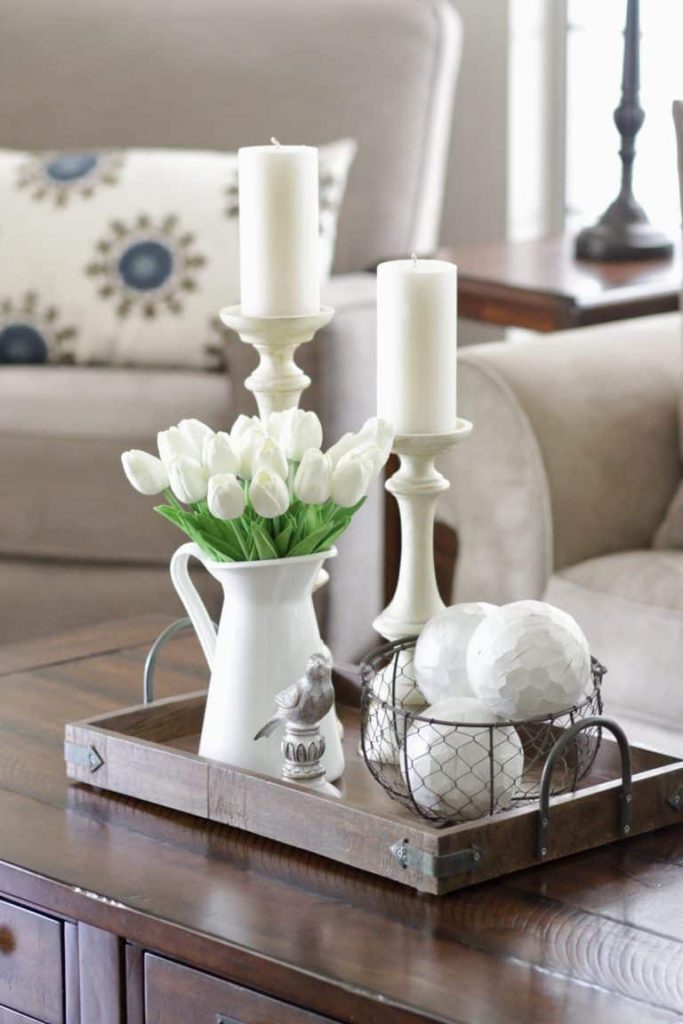 Grab these coffee table decor ideas for a cozy living room. This post is awesome, it has a list of must have elements for cozy coffee table styling plus a list of supply ideas for your cozy coffee table to be magazine worthy! #coffeetablestyle #coffeetabledecor #vignettestyling #decortips #decorating101 #decoratingtips #cozylivingroom #livingroomdecor #coffeetabledecorideas