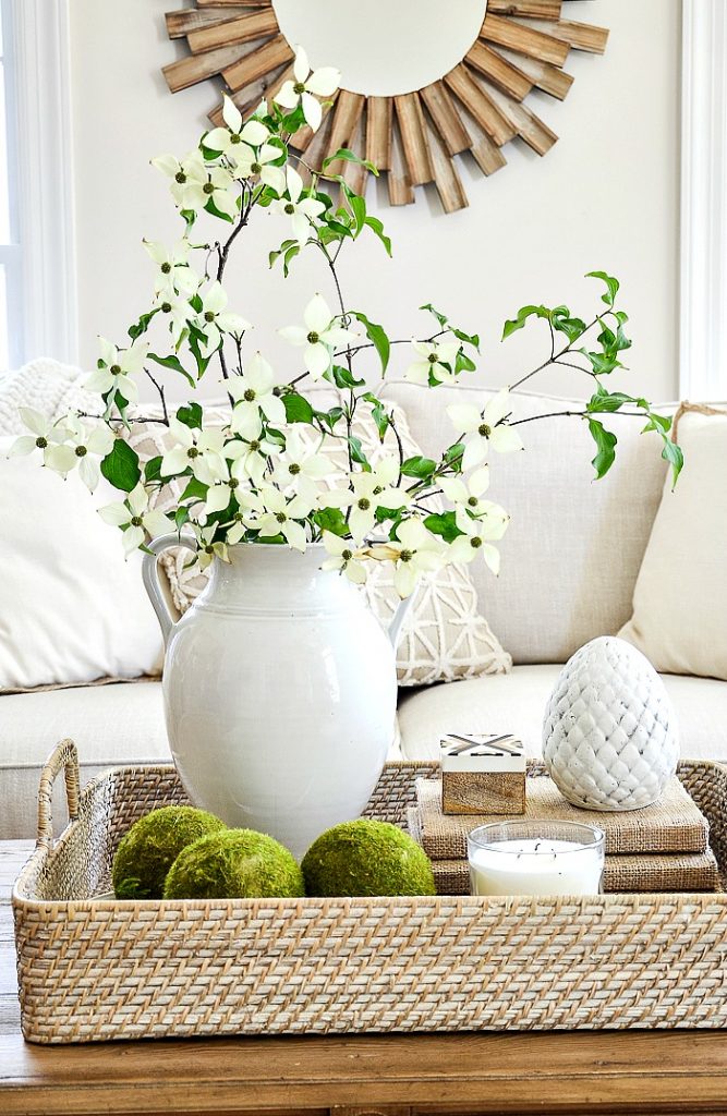 Grab these coffee table decor ideas for a cozy living room. This post is awesome, it has a list of must have elements for cozy coffee table styling plus a list of supply ideas for your cozy coffee table to be magazine worthy! #coffeetablestyle #coffeetabledecor #vignettestyling #decortips #decorating101 #decoratingtips #cozylivingroom #livingroomdecor #coffeetabledecorideas