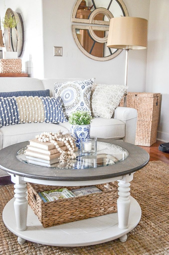 Grab these coffee table decor ideas for a cozy living room. This post is awesome, it has a list of must have elements for cozy coffee table styling plus a list of supply ideas for your cozy coffee table to be magazine worthy! #coffeetablestyle #coffeetabledecor #vignettestyling #decortips #decorating101 #decoratingtips #cozylivingroom #livingroomdecor #coffeetabledecorideas