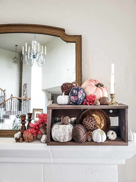 If you've ever wondered how to make easy fabric pumpkins this is the post for you! I am going to show you three ways to make fall pumpkins for your home decor, including a no sew fabric pumpkin tutorial! Your house can be full of farmhouse stuffed pumpkins on a budget. #diypumpkins #fallhomedecor #fallcraftidea #nosewpumpkin #diypumpkinpattern #shabbychicpumpkin #pumpkintutorial #cozyfallhome