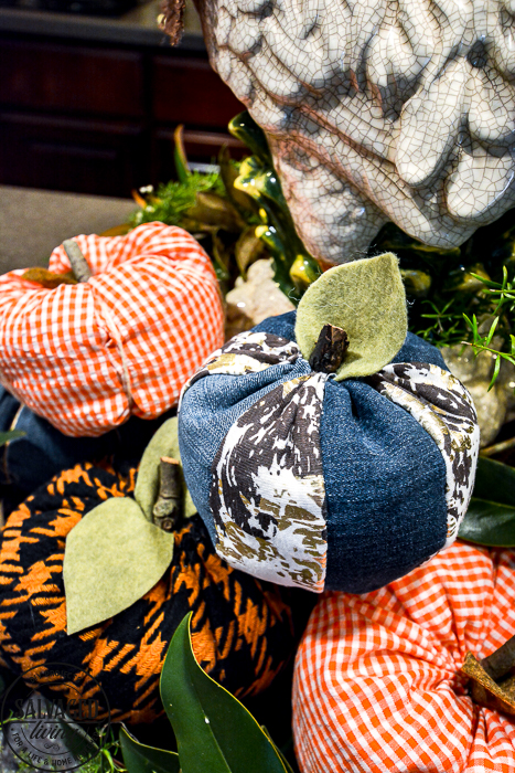 If you've ever wondered how to make easy fabric pumpkins this is the post for you! I am going to show you three ways to make fall pumpkins for your home decor, including a no sew fabric pumpkin tutorial! Your house can be full of farmhouse stuffed pumpkins on a budget. #diypumpkins #fallhomedecor #fallcraftidea #nosewpumpkin #diypumpkinpattern #shabbychicpumpkin #pumpkintutorial #cozyfallhome