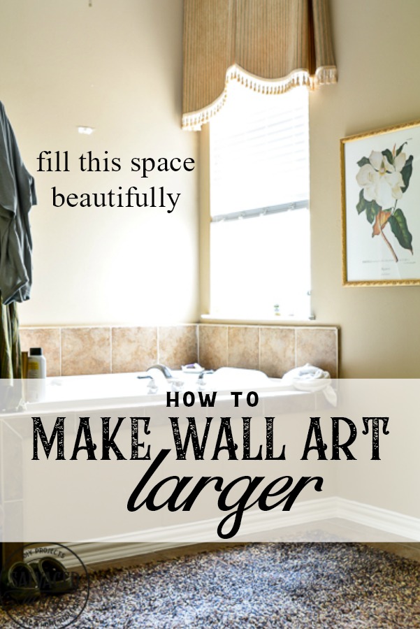 How to make wall art larger. Make sure you fill your walls with the correct scale artwork. This decorating idea will help you use what you have to make artwork that fits your space beautifully. #walart #decoratinghack #decoratingtip #DIYwallart #interiordecorting 