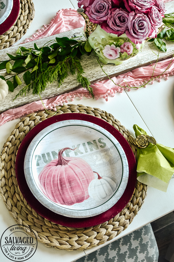 Get some great fall decorating tips on a budget with this elegant tablescape idea for fall. Plus see a ton of fall decorating ideas in the fall round up - you can get fall mantel ideas, beautiful fall wreath inspiration, fall sign ideas and more! #fallideas #budgetdecoratingforfall #budgetdecor #dollarstoretable #fall #dollartreedecor #pinkfall #gargesalefall #fallwreath #fallmantel #DIYfallsign