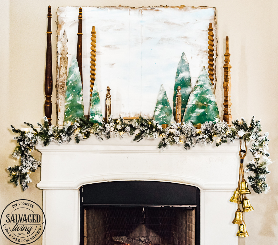 Decorate your mantel with these budget friendly ideas this Christmas! Plus I have a great tip on how to hang garland without nails for damage free decorating! This simple cardboard craft rounds out the Christmas fireplace decorations! #DamageFreeHolidayDecor #CommandDoNoHarm #cardboarddecor #fireplacedecor #vintageChristmas #budgetgarland #easyChristmasdecor 