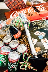 The ultimate list of family games for a family game night gift basket. The perfect gift for a family with tweens and teens plus extra gift ideas to tuck into your basket for the perfect party at home for a family with kids at Christmas. #JoinTheFizztivities #christmasgift #familygamenight #holidaygiftidea #teengift