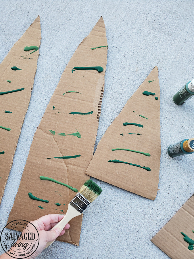 Decorate your mantel with these budget friendly ideas this Christmas! Plus I have a great tip on how to hang garland without nails for damage free decorating! This simple cardboard craft rounds out the Christmas fireplace decorations! #DamageFreeHolidayDecor #CommandDoNoHarm #cardboarddecor #fireplacedecor #vintageChristmas #budgetgarland #easyChristmasdecor 