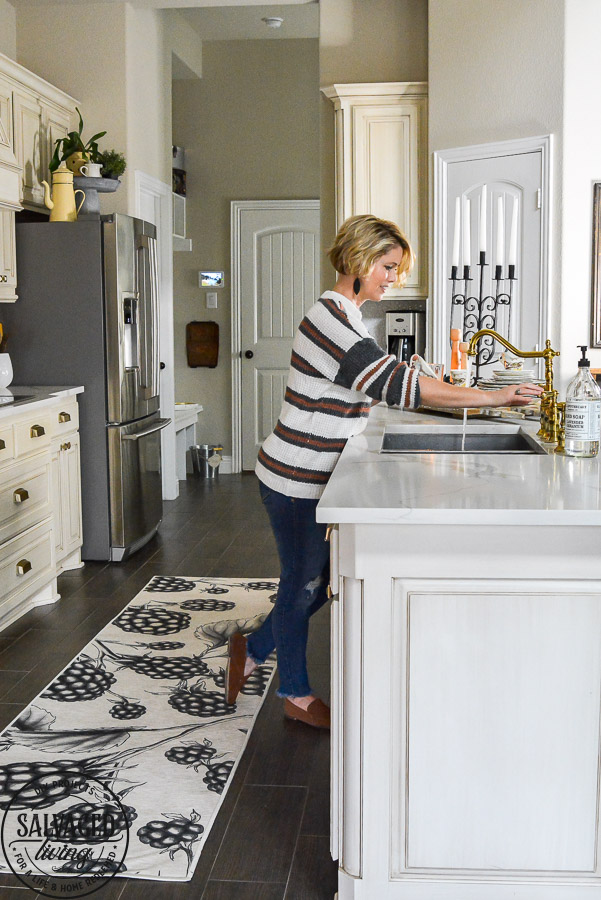 We LOVE our new machine washable rug for the kitchen. This Ruggable Rug in a berry print adds whimsical fun to our kitchen, is stain resistant and stays in place. You can see a video of how our new kitchen rug runner is the best kitchen rug for us on the blog! #kitchenrug #washablerug #affirdablerug 