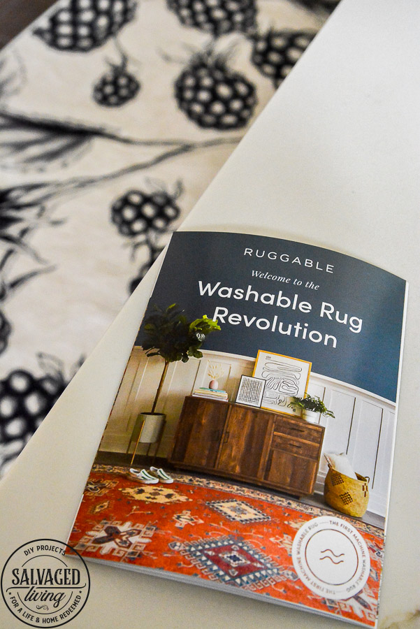 We LOVE our new machine washable rug for the kitchen. This Ruggable Rug in a berry print adds whimsical fun to our kitchen, is stain resistant and stays in place. You can see a video of how our new kitchen rug runner is the best kitchen rug for us on the blog! #kitchenrug #washablerug #affirdablerug 