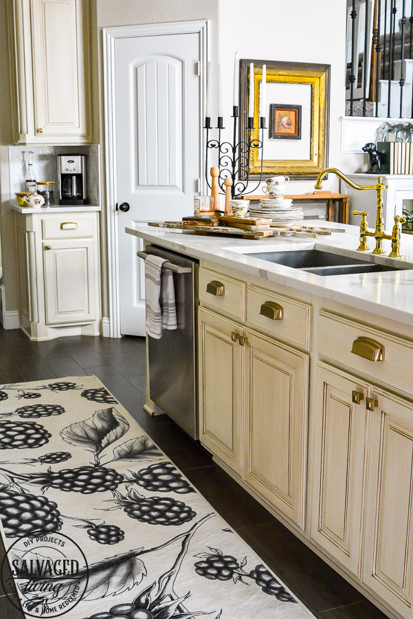 We LOVE our new machine washable rug for the kitchen. This Ruggable Rug in a berry print adds whimsical fun to our kitchen, is stain resistant and stays in place. You can see a video of how our new kitchen rug runner is the best kitchen rug for us on the blog! #kitchenrug #washablerug #affirdablerug 