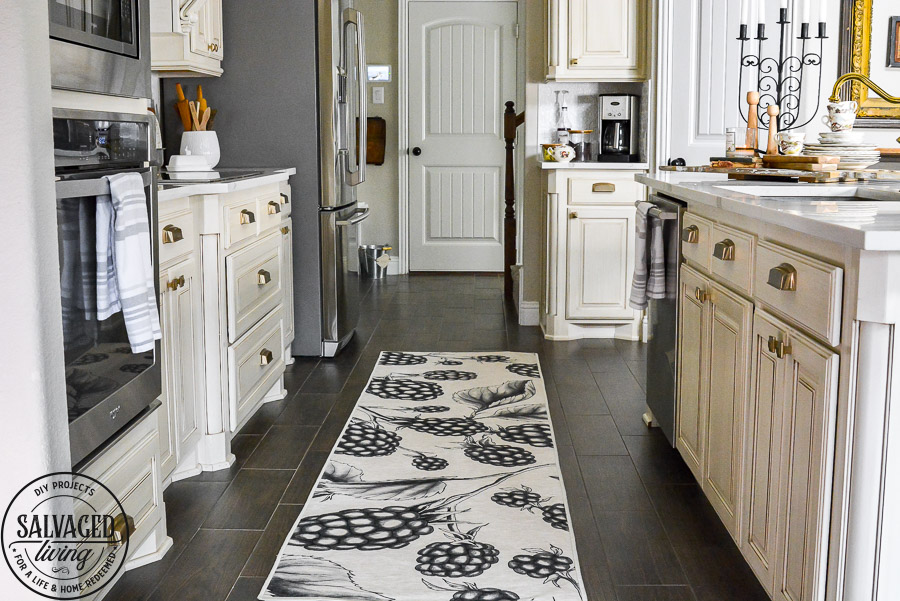 We LOVE our new machine washable rug for the kitchen. This Ruggable Rug in a berry print adds whimsical fun to our kitchen, is stain resistant and stays in place. You can see a video of how our new kitchen rug runner is the best kitchen rug for us on the blog! #kitchenrug #washablerug #affirdablerug