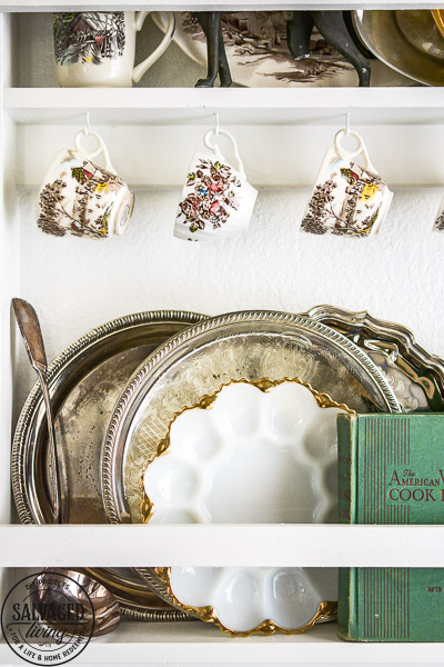 Does you house lack built in charm? Add your own with this diy built in plate rack tutorial. You will learn how to build a wall plate rack and how to decorate a plate rack for vintage style charm and a cozy home. #cozyhome #farmhousekitchen #kitchendisplay #butlerspantry